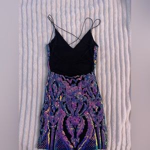 Sequin mini dress with open back.